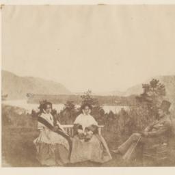 Two Seated Women and Man by...