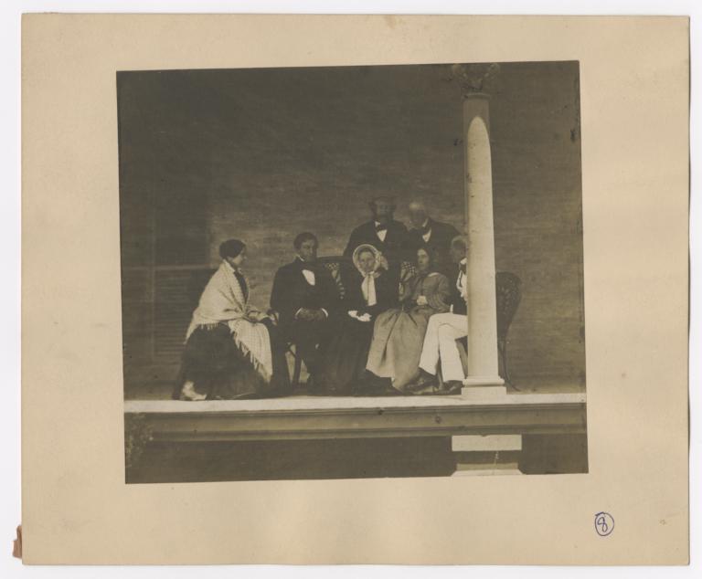 Group of Seven People on Porch