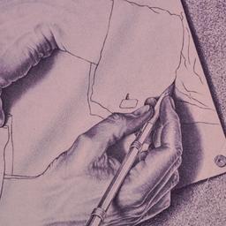 Drawing hands by M. C. Escher.