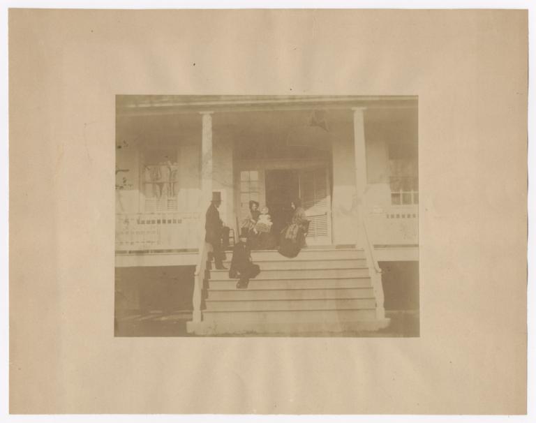Four People and Baby on Porch