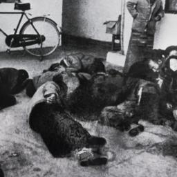 Tibetan detainees on cement...
