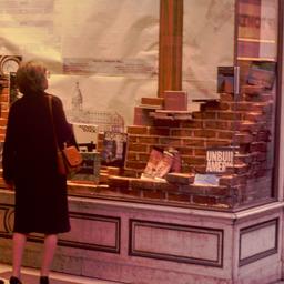 People viewing window display.