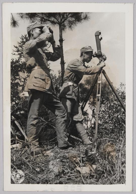 Chinese Men Surveying With Periscope