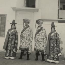Four Tibetans in traditiona...