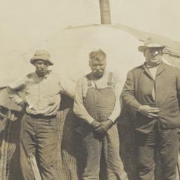 Three Men in front of Wickiup