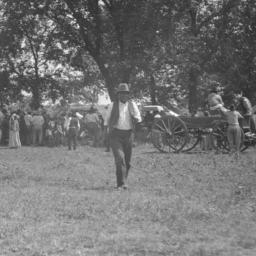 Man Walking toward the Came...