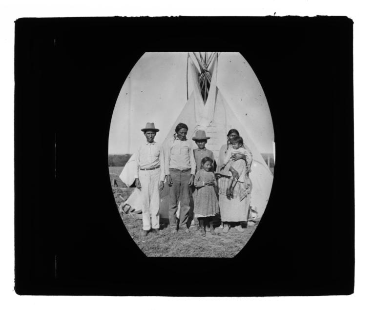 Small Group of Men, Women and Children in front of a Tipi