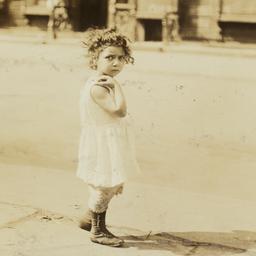 Little Girl on Sidewalk