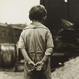 Boy With Hands Behind his Back