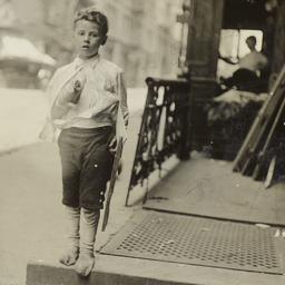 Boy in Socks on Curb