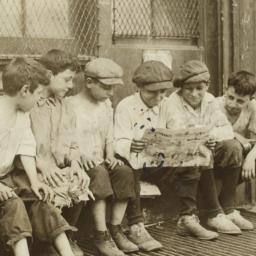 Boys Reading Newspaper