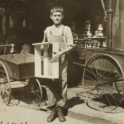 Boy with Box near Empty Pus...