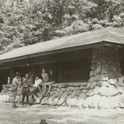Boys Outside Cabin near Woods